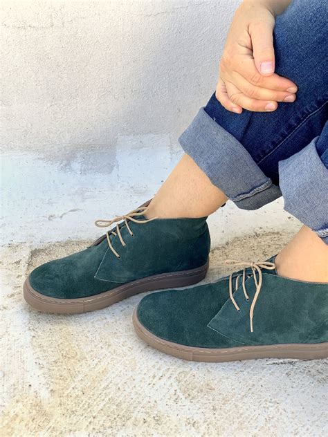 green leather sneakers for women.